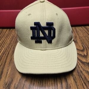 Unisex New Era Notre Dame Fitted Cap.